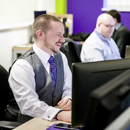 One of our team working on IT Support One of our team working on IT Support